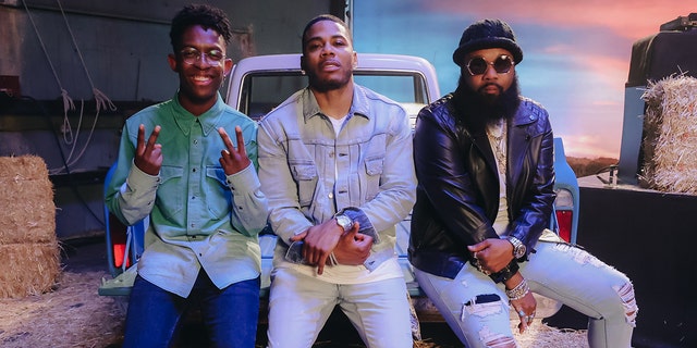 Breland, Nelly and Blanco Brown perform on the set of their new single music video shoot with Breland and Blanco Brown on July 19, 2021 in Los Angeles, Calif.