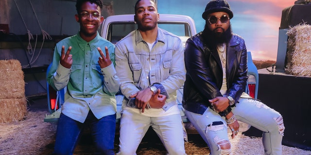 Breland, Nelly and Blanco Brown perform on the set of their new single music video shoot with Breland and Blanco Brown on July 19, 2021 in Los Angeles, Calif.