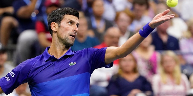 Novak Djokovic, of Serbia, serves against Jenson Brooksby, of the United States, during the fourth round of the U.S. Open tennis championships, Monday, Sept. 6, 2021, in New York. (AP Photo/John Minchillo)