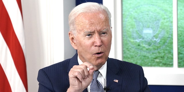 U.S. President Joe Biden speaks during a virtual Covid-19 Summit on the sidelines of the United Nations General Assembly in the Eisenhower Executive Office Building in Washington, D.C., U.S., on Wednesday, Sept. 22, 2021. Biden is calling for 70% of the world to be vaccinated by this time next year during the summit that's intended to spur countries, businesses and organizations to set firm targets to defeat the coronavirus pandemic. Photographer: Andrew Harrer/Bloomberg via Getty Images 