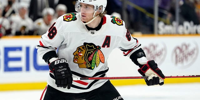 In this April 3, 2021 file photo, Chicago Blackhawks right wing Patrick Kane (88) skates against the Nashville Predators during the third period of an NHL hockey game in Nashville.