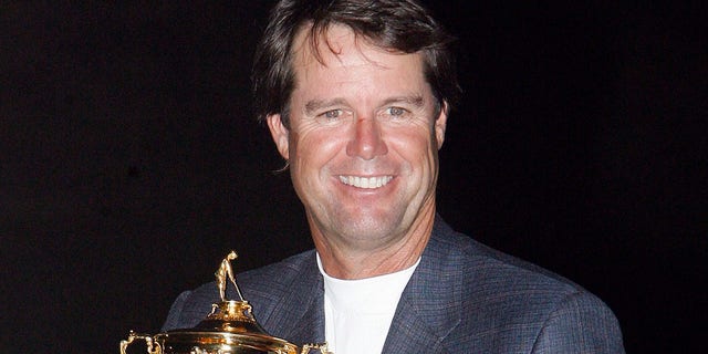 USA Captain Paul Azinger celebrates with the Ryder Cup.