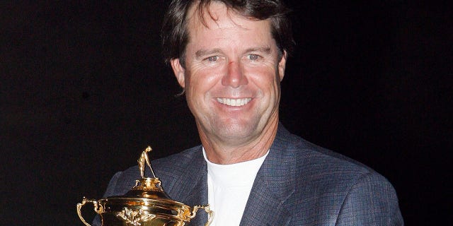USA Captain Paul Azinger celebrates with the Ryder Cup.
