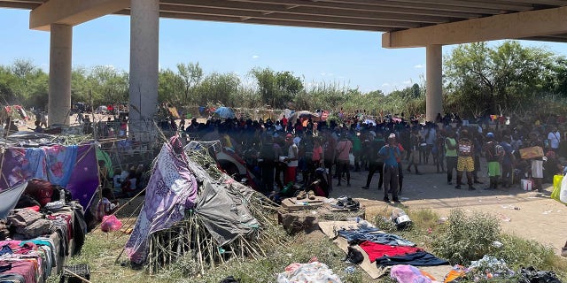 Sept. 18, 2021: Migrants camp under the International Bridge in Del Rio. [Rep. Pfluger.)