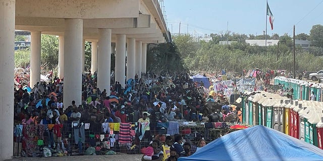Migrants camp under the International Bridge in on Sept. 18, 2021, in Del Rio, Texas. (Rep. August Pfluger.)