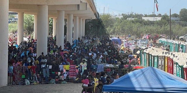 Migrants camp under the International Bridge in on Sept. 18, 2021, in Del Rio, Texas. (Rep. August Pfluger.)