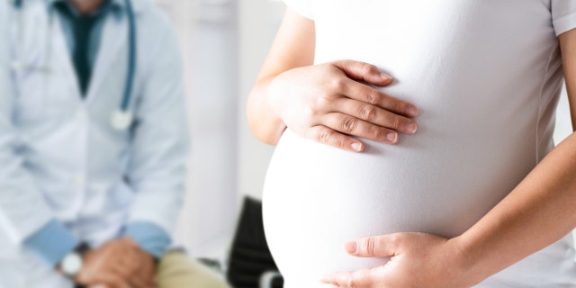 A pregnant woman visiting the doctor. (iStock)