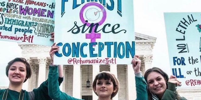 Kay Fellows, a liberal pro-life activist, protests at the Supreme Court. (Photo credit: Maria Oswalt)