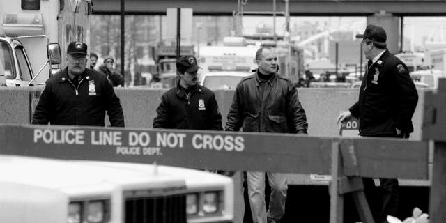 World Trade Center bombing Police Commissioner Ray Kelly comes out of the hole with Emergency Service Cops. (Bill Turnbull/NY Daily News Archive via Getty Images)