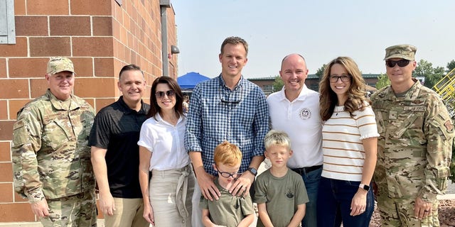 Rep. Moore with his boys, Utah’s governor and first lady, Utah’s lieutenant governor and second gentleman, and service members at Utah’s military family day celebration earlier this summer. 