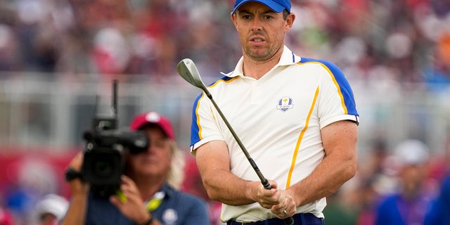 Team Europe's Rory McIlroy watches his shot on the 15th hole during a Ryder Cup singles match at the Whistling Straits Golf Course Sunday, Sept. 26, 2021, in Sheboygan, Wis.