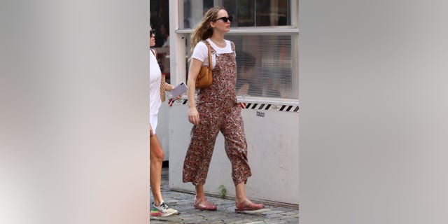Pregnant Jennifer Lawrence seen for the first time showing a baby bump after having lunch in Manhattan’s Downtown area.
