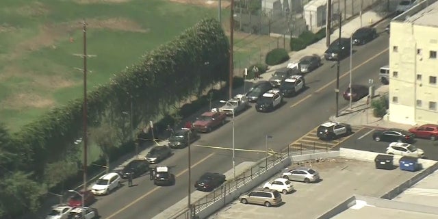 Police securing the perimeter of the school.