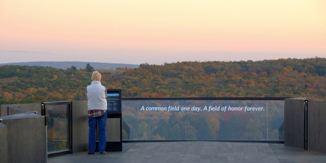 A visitor stands at the Flight 93 Memorial