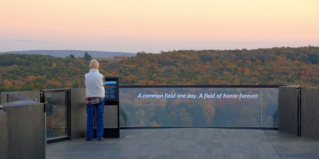 A visitor stands at the Flight 93 Memorial