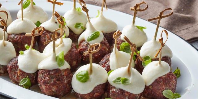 Chris Lilly, world championship pitmaster and spokesperson for the famed charcoal briquette company, Kingsford, shared his recipe for Smoked Hickory Meatball Skewers with Mozzarella.