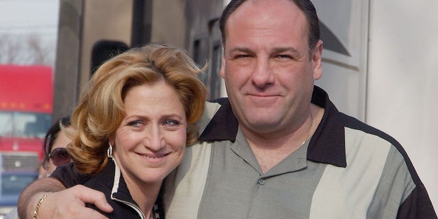 Actor James Gandolfini (R) and actress Edie Falco pose on site for the filming of the final episode of "The Sopranos" March 22, 2007 in Bloomfield, New Jersey.