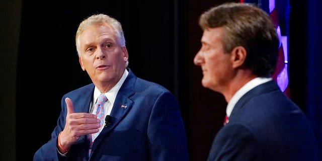 Virginia Democratic gubernatorial candidate former Governor Terry McAuliffe debates Republican nominee and businessman Glenn Youngkin at the Appalachian School of Law in Grundy, Virginia, on Sept. 16, 2021  (AP Photo/Steve Helber, File)