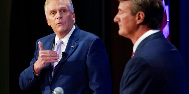 Virginia Democratic gubernatorial candidate former Governor Terry McAuliffe debates Republican nominee and businessman Glenn Youngkin at the Appalachian School of Law in Grundy, Virginia, on Sept. 16, 2021  (AP Photo/Steve Helber, File)