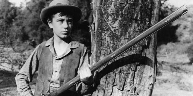American child actor Tommy Kirk as Travis Coates in the film 'Old Yeller', 1957.
