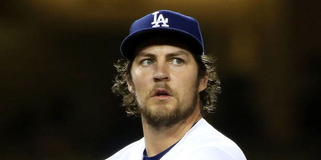 Trevor Bauer of the Los Angeles Dodgers after giving up a hit to Joey Gallo of the Texas Rangers at Dodger Stadium June 12, 2021, in Los Angeles.