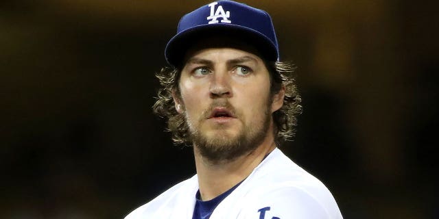 Trevor Bauer of the Los Angeles Dodgers after giving up a hit to Joey Gallo of the Texas Rangers at Dodger Stadium June 12, 2021, in Los Angeles.