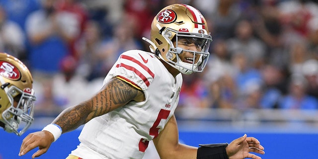 San Francisco 49ers quarterback Trey Lance signals the line of scrimmage against the Detroit Lions in the first half in Detroit on Sunday, September 12, 2021. 