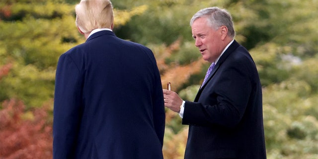 WASHINGTON, DC - SEPTEMBER 01: U.S. President Donald Trump confers with White House Chief of Staff Mark Meadows