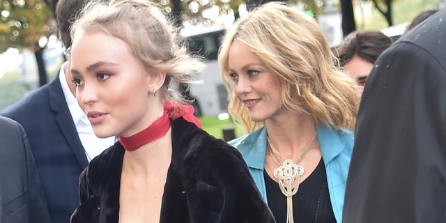 Lily-Rose Deep and Vanessa Paradis arrive at Chanel Fashion Show during the Paris Fashion Week on October 6, 2015 in France.