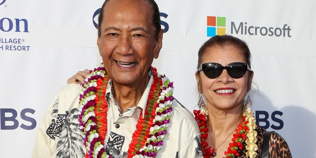Al Harrington (L) and his wife attend the Sunset On The Beach event celebrating the 10th season of ‘Hawaii Five-0’ and season 2 of ‘Magnum P.I.’ at Queen's Surf Beach on September 19, 2019 in Waikiki, Hawai. (