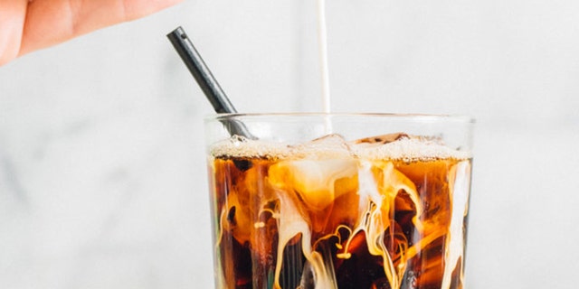 Start International Coffee Day with this refreshing peanut butter iced latte from PB2 Foods.