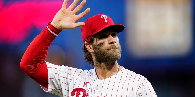 Philadelphia Phillies' Bryce Harper waves to the crowd before an interleague baseball game against the Baltimore Orioles, Wednesday, Sept. 22, 2021, in Philadelphia. 