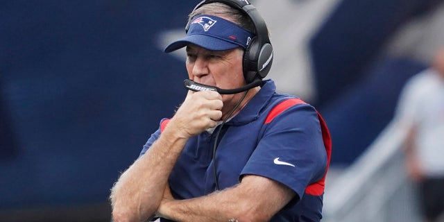 New England Patriots head coach Bill Belichick looks on during an NFL football game against the New Orleans Saints, Sunday, Sept. 26, 2021, in Foxborough, Mass.