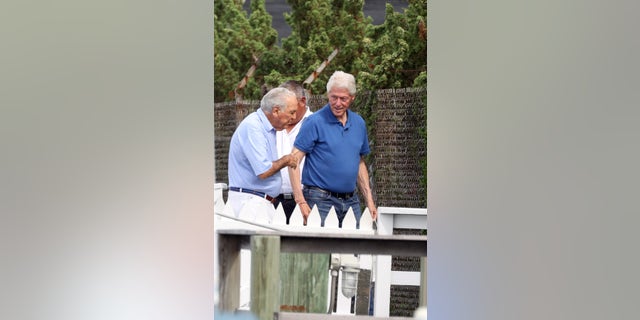 Pictured: Bill Clinton,Alfonso Fanjul Ref: SPL5250460 310821 EXCLUSIVE Picture by: Matt Agudo / SplashNews.com