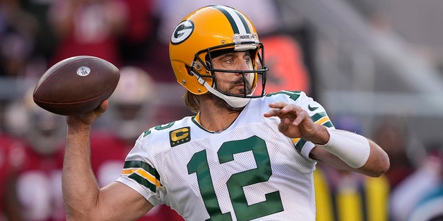 Green Bay Packers quarterback Aaron Rodgers passes against the San Francisco 49ers during the first half of a game in Santa Clara, California on September 26, 2021. 
