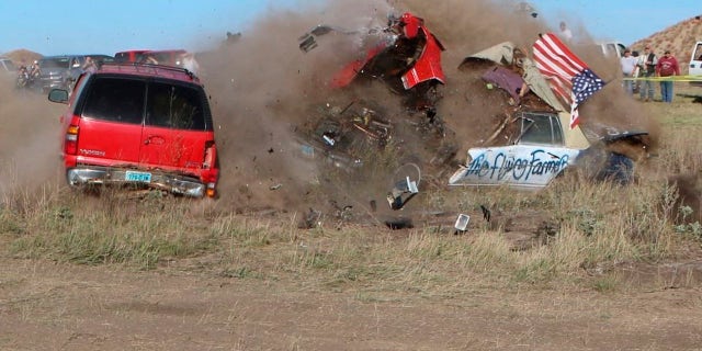 John Smith, known as the Flying Farmer, crashed his Chevrolet Caprice while attempting a jump in Makoti, N.D.