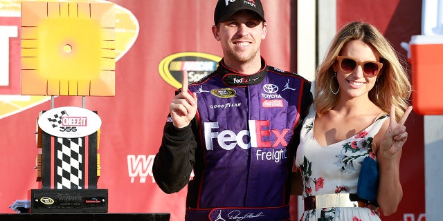 Denny Hamlin and Jordan Fish celebrated his 2016 victory at Watkins Glen together.