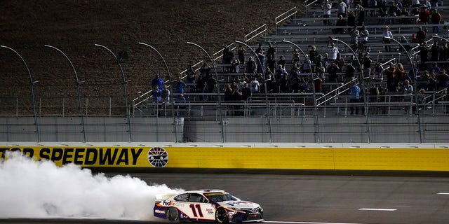 Denny Hamlin performed a celebrator burnout after winning the NASCAR Cup Series auto race at the Las Vegas Motor Speedway.