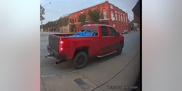 This stolen red truck, which was located roughly 50 miles away on Monday, was the getaway vehicle.
