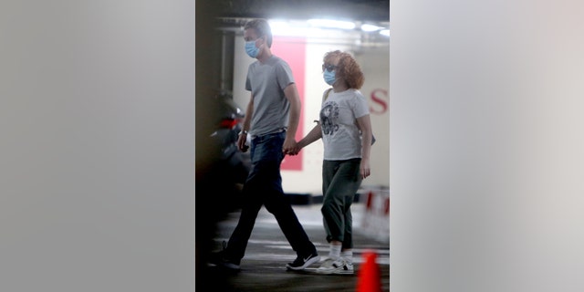 The comedian is spotted running errands, holding hands with her spouse who she married in 2020. 