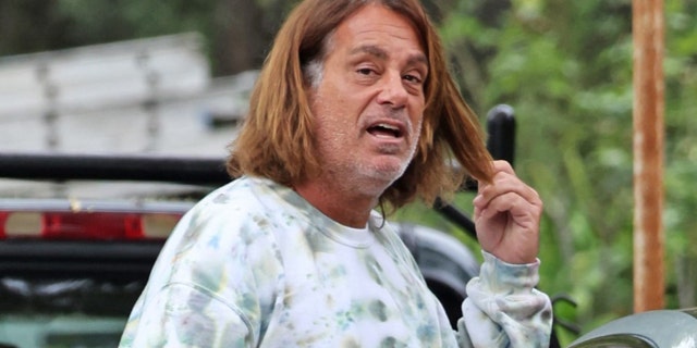 Peter Dante was seen walking barefoot around his neighborhood. 