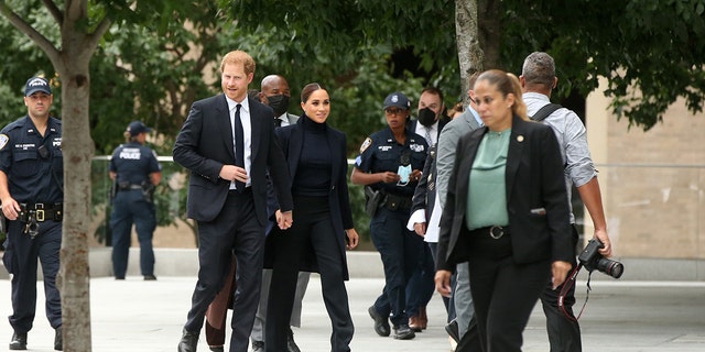 Prince Harry and Meghan Markle held hands as they walked through New York City to attend an event with New York Gov. Kathy Hochul and Mayor Bill de Blasio.