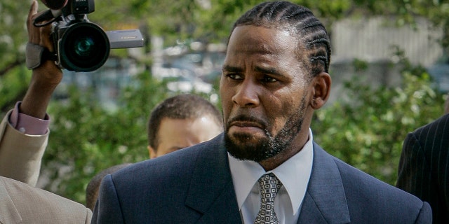 This photo from Friday, May 9, 2008, shows R. Kelly arriving for the first day of jury selection in his child pornography trial at the Cook County Criminal Courthouse in Chicago. On Wednesday, Sept. 15, 2021, prosecutors in Kelly's sex trafficking trial at Brooklyn Federal Court in New York, played video and audio recordings for the jury they say back up allegations he abused women and girls.