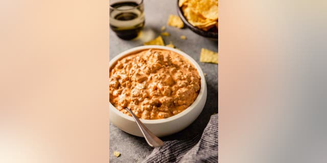 If you're looking for a delicious app that's been described as "addictive," check out this super-simple sausage dip from the Brown Eyed Baker. 