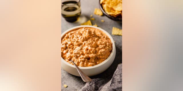 If you're looking for a delicious app that's been described as "addictive," check out this super-simple sausage dip from the Brown Eyed Baker. 