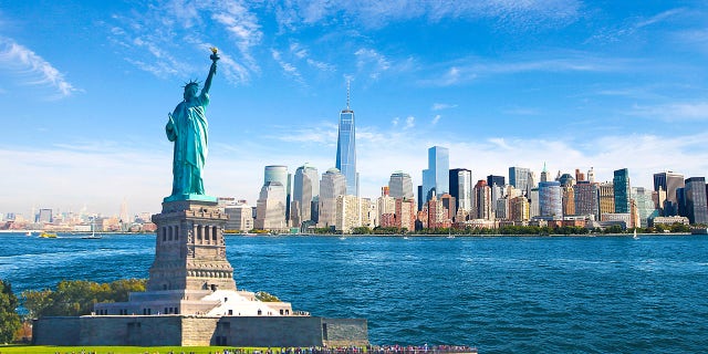 Amazing view of the Statue of Liberty, Skyline, One World Trade Center.