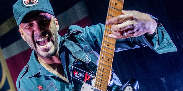 Rage Against The Machine's Tom Morello was accidentally tackled by security after a fan rushed the state during a concert in Toronto, Canada on Saturday night.