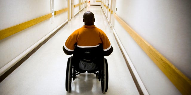 A Virginia man goes through physical therapy at the Veterans Affairs Medical Center in Washington, D.C.