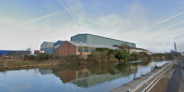 The nondescript building is among a row of warehouses in North London.