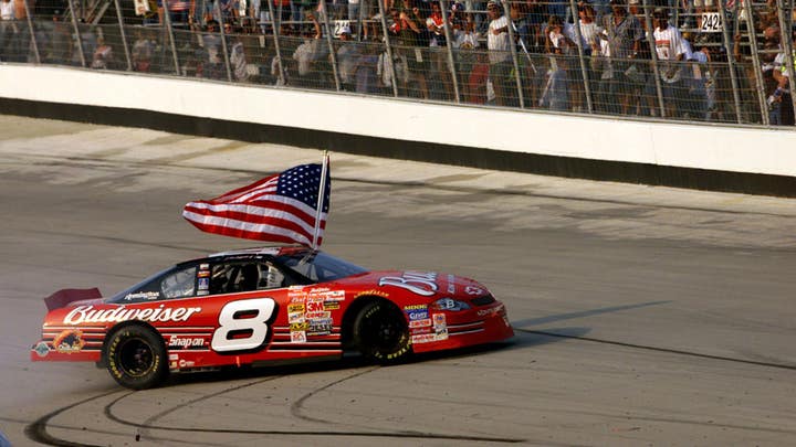 Cuban American NASCAR star Aric Almirola reminds fans that "our freedom is not free"